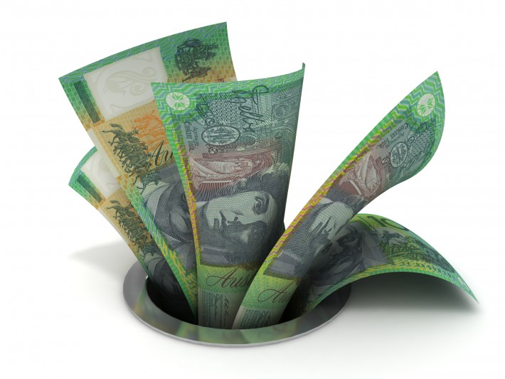 Money-Down-the-Drain-iStock_13971739-710x533