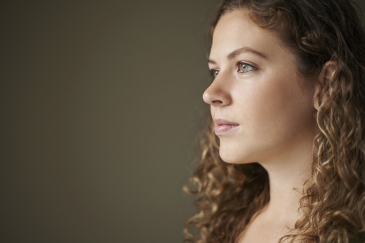 Studio shot of an attractive young thoughtful woman http://195.154.178.81/DATA/istock_collage/a12/shoots/785217.jpg