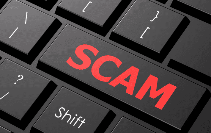 Scam-on-keyboard-cropped-710x447
