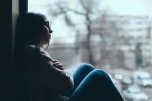 Girl-gazing-out-of-window-iStock_84825173-710x4731